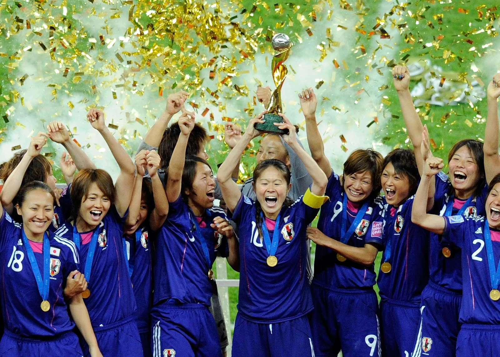 Players from Japan celebrate winning the World Cup in 2011.