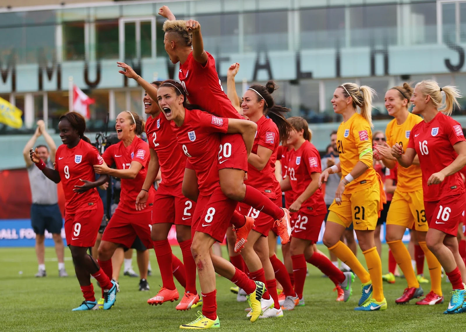 England players celebrating their win in the FIFA Women's World Cup 2015 third place play-off match between Germany and England.