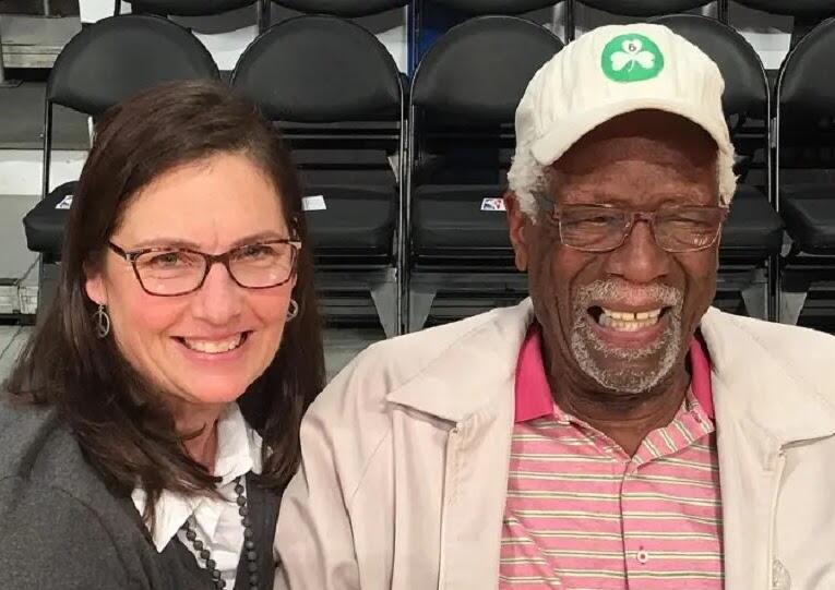 Bill Russell and his wife at a basketball game