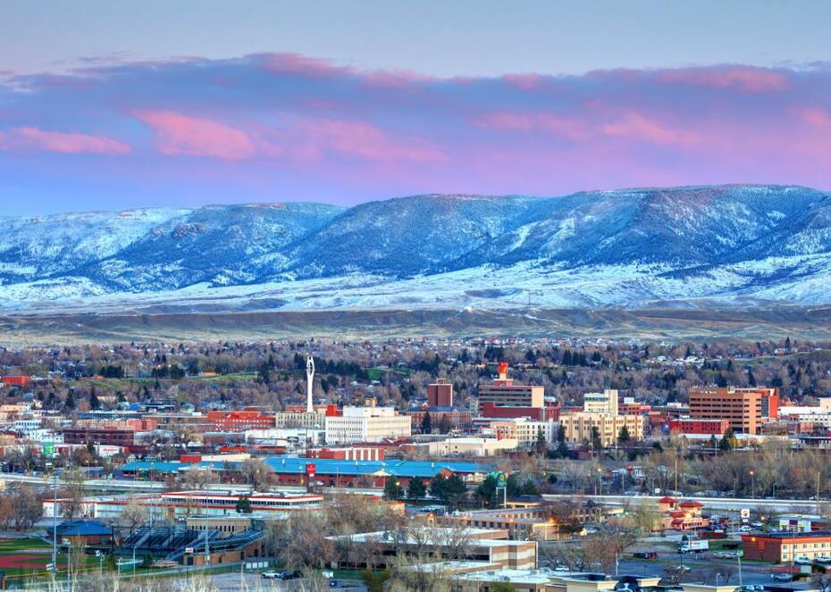 Casper, Wyoming with snow on the mountains in the background